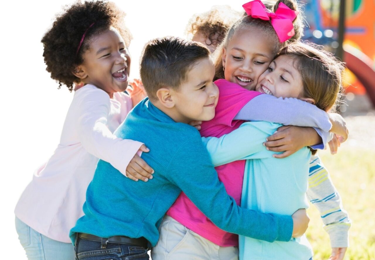 Children sharing a happy moment outdoors
